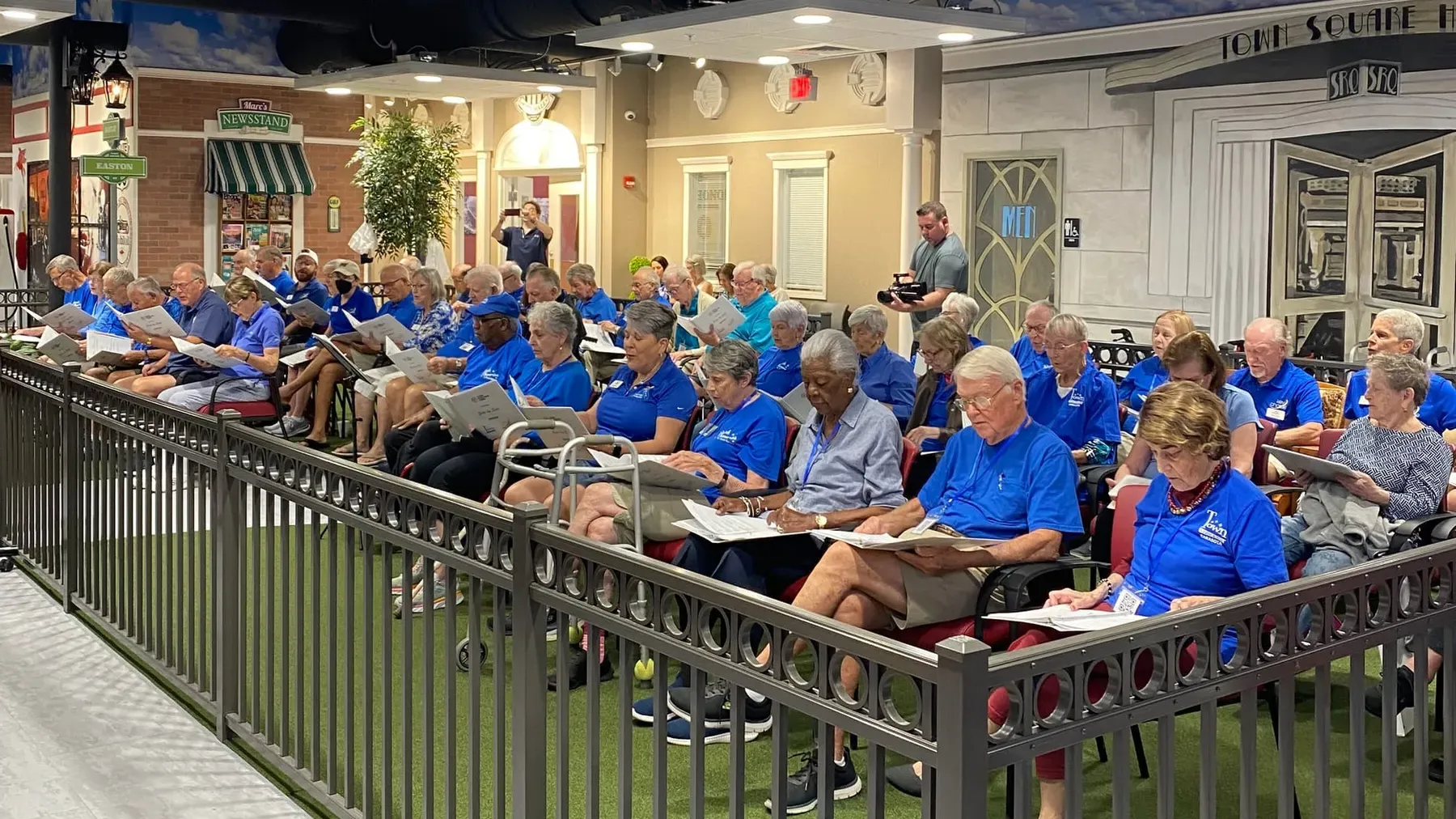 Senior Outreach program participants singing together during a Key Chorale community session.